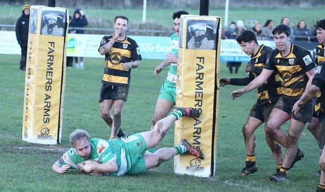 Prop Ieuan James crashes over for Emlyn